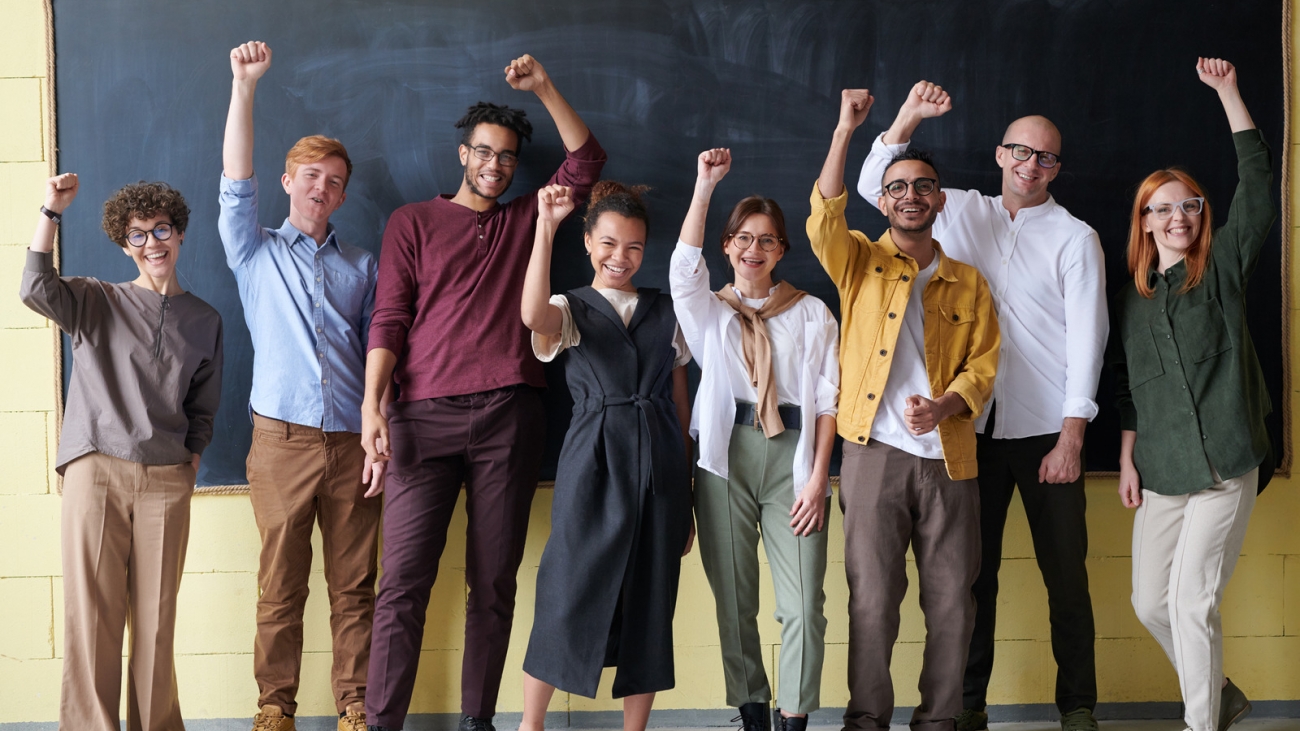 Canva - Group of People Standing infront of Blackboard (1)