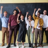 Canva - Group of People Standing infront of Blackboard (1)